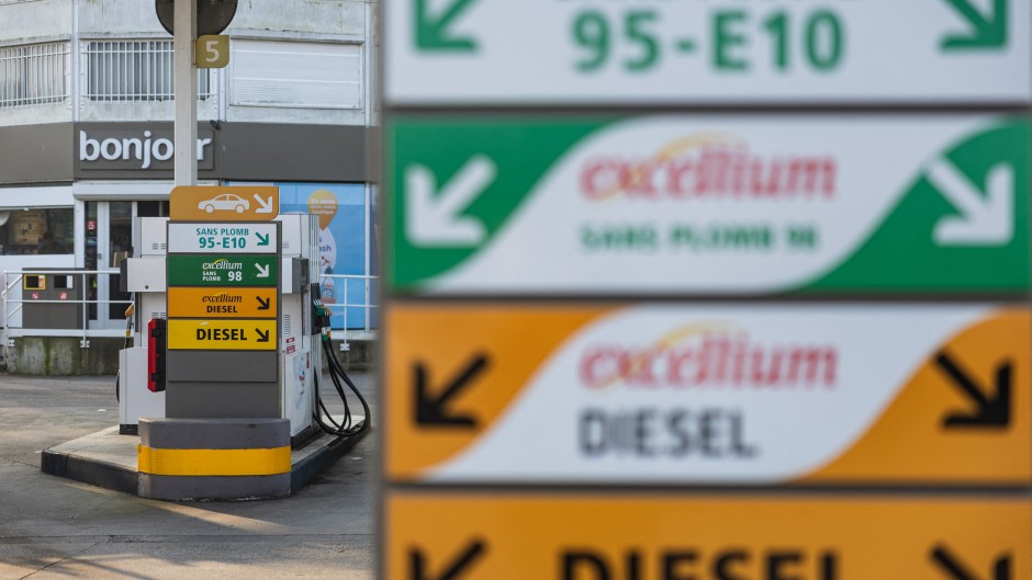 Signs of different kinds of fuel at a Total Energy petrol station in Saint-Leonard. AFP/Sameer Al-Doumy