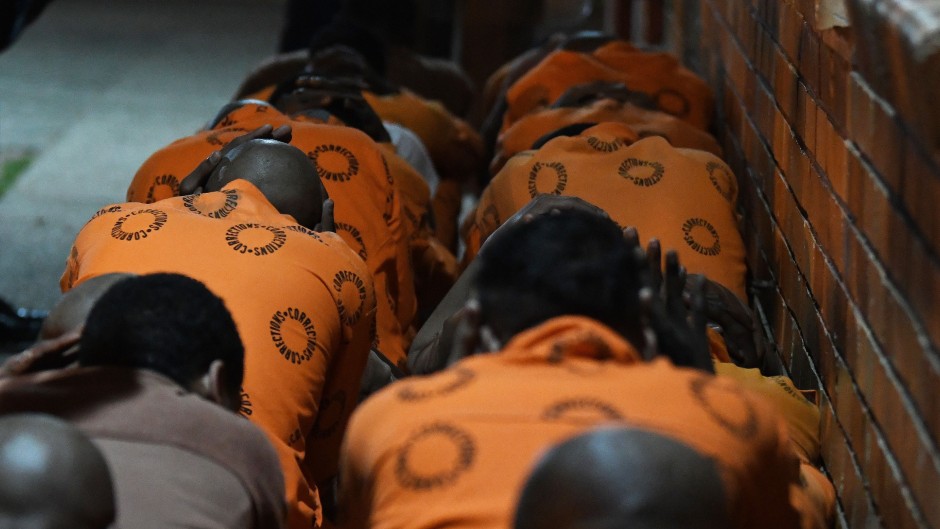 Officials pounce on inmates at St Albans Prison. Lulama Zenzile/Gallo Images