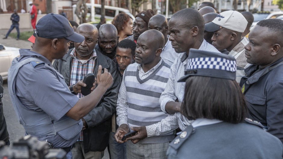 On Tuesday, refugees in Durban turned to police, seeking protection from groups like March and March. Photo by RAJESH JANTILAL / AFP