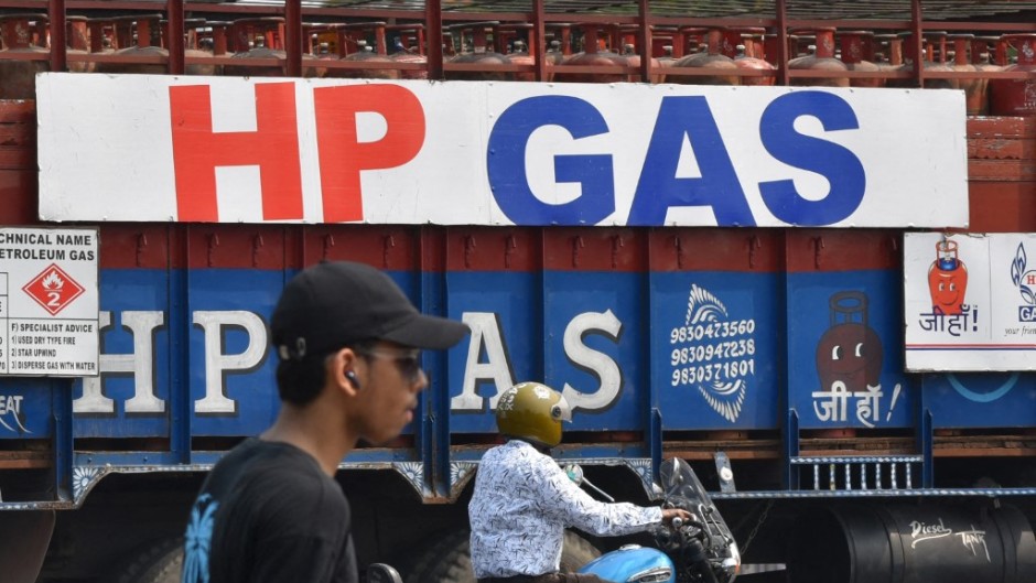 A full delivery truck of HP gas cylinders moves on the street in Kolkata. Sudipta Das/NurPhoto via AFP