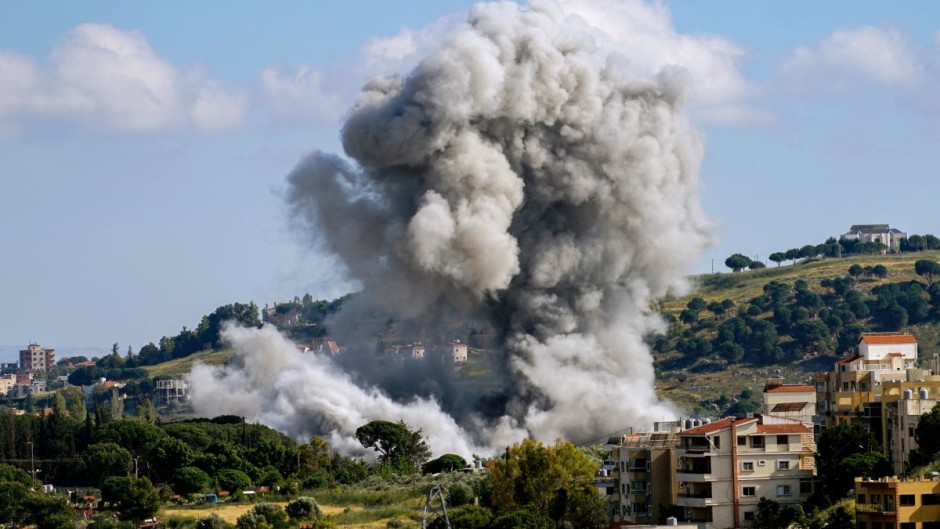 Smoke rises following an Israeli airstrike that targeted the southern Lebanese village of Nabatieh. AFP/Abbas Fakih