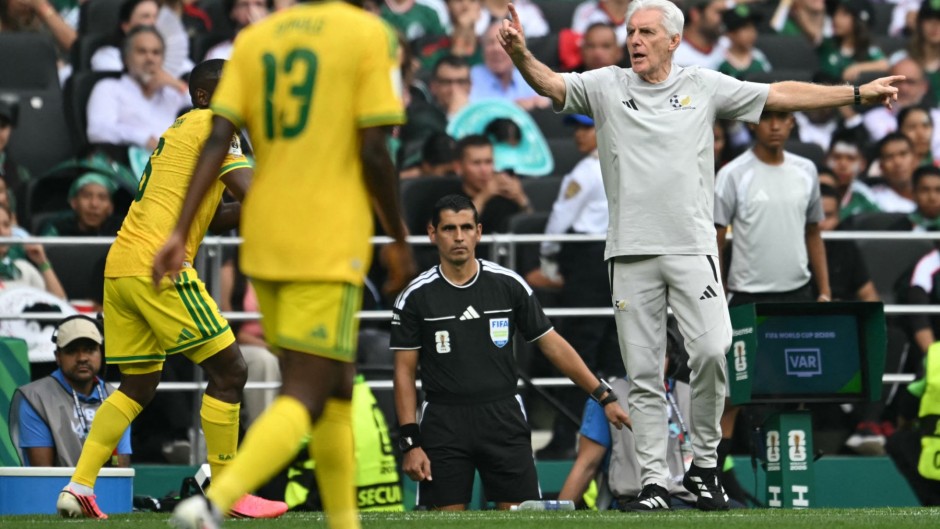 Coach Hugo Broos gestures during the 2026 World Cup Group A football match between Mexico and South Africa. AFP/Yuri Cortez