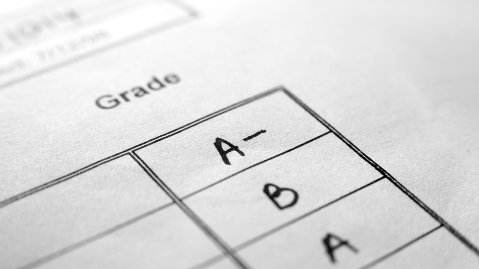 File: A close-up of a report card. GettyImages/jaker5000
