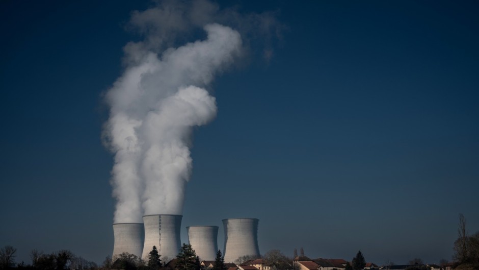 vapor rising from cooling towers of the Bugey nuclear power plant in Saint-Vulbas. AFP/Jean-Philippe Ksiazek