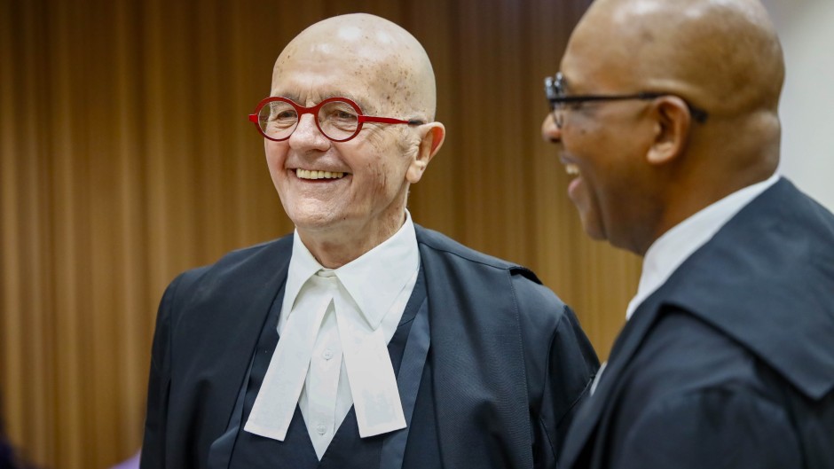 Advocate Wim Trengove and Adv Dali Mpofu share a light moment at the urgent interdict hearing on Phala Phala at Western Cape High Court.  ER Lombard/Gallo Images