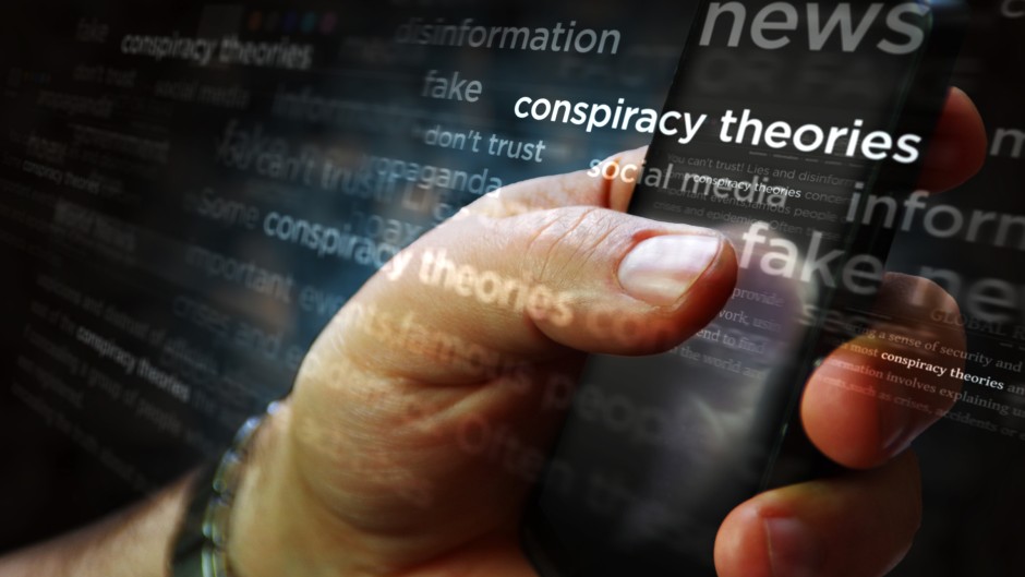 File: Social media on display with conspiracy theories, hoax theory and fake news. GettyImages/Arkadiusz Wargula