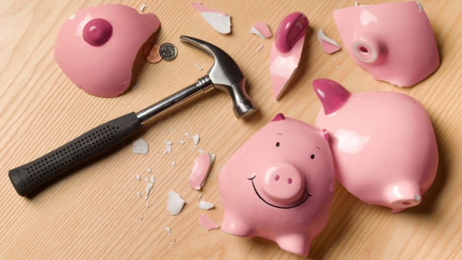 File: A smashed piggy bank. GettyImages/The Image Bank