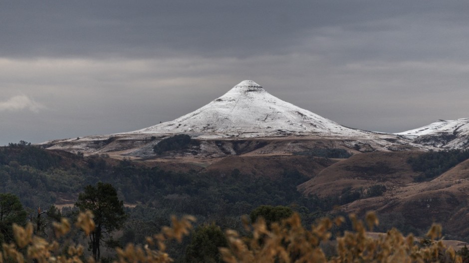 Snow on a mountain as seen from Nottingham Road near Pietermaritzburg. AFP/Rajesh Jantilal
