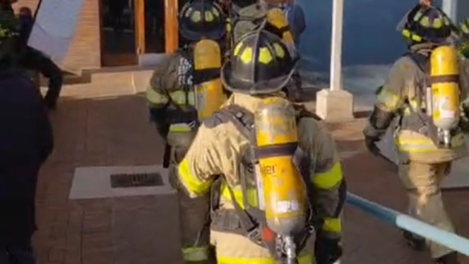 Firefighters on their way into the Madlanga Commission venue. eNCA