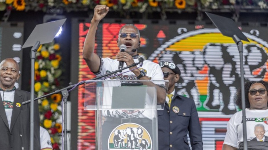 IFP leader Velenkosini Hlabisa addresses supporters during the 2026 local government election manifesto launch. AFP/Rajesh Jantilal