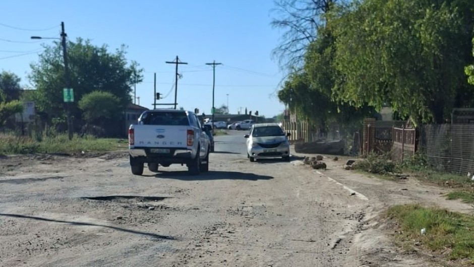 Motorists trying to navigate a pothole-ridden road in Mahikeng. eNCA/Bafedile Moerane