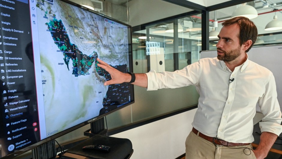 Jean Maynier, president of ship tracking data company Kpler, shows the vessels tracking application. AFP/Roslan Rahman