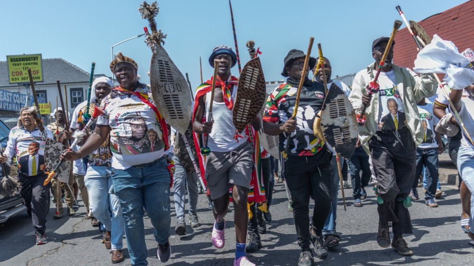 Protestors from the anti-illegal immigration group, March and March Movement chant slogans and march outside the Department of Home Affairs Refugee Reception Centre during a demonstration at the Che Guevara Road in Durban, on October 8, 2026.