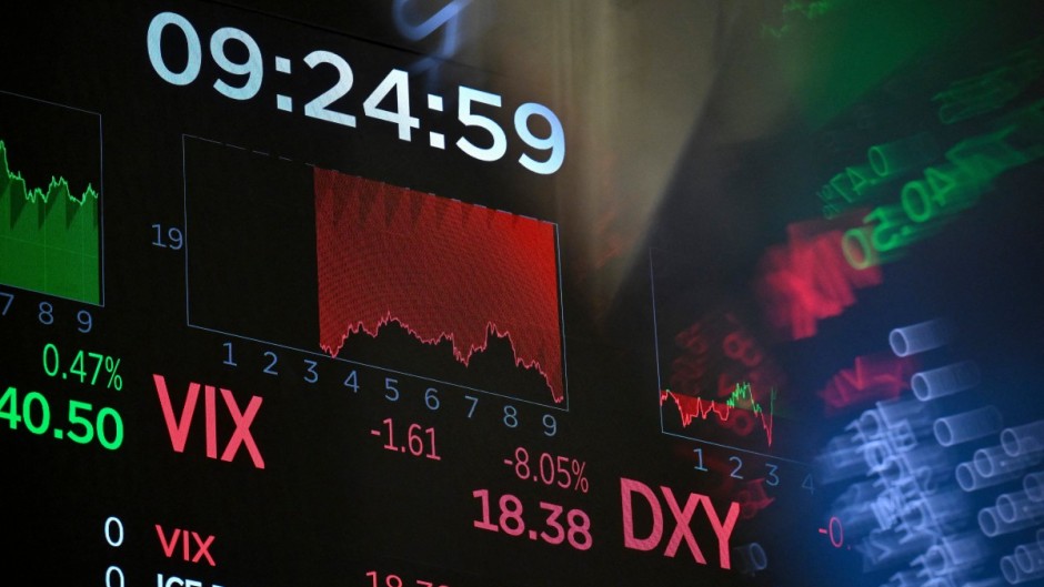 Trading numbers are displayed at the New York Stock Exchange (NYSE) at the opening bell in New York City. AFP/Angela Weiss