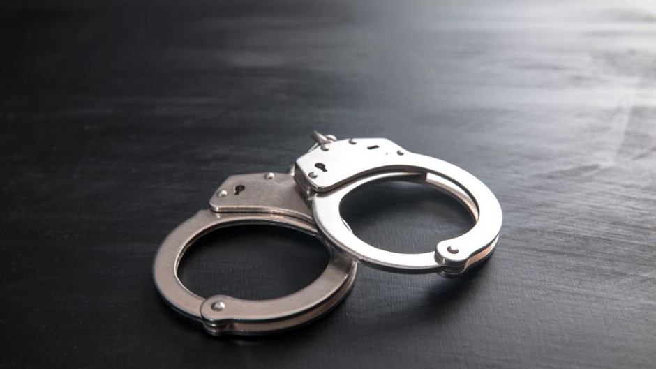 File: A pair of handcuffs. Getty Images/Daniel Tadevosyan