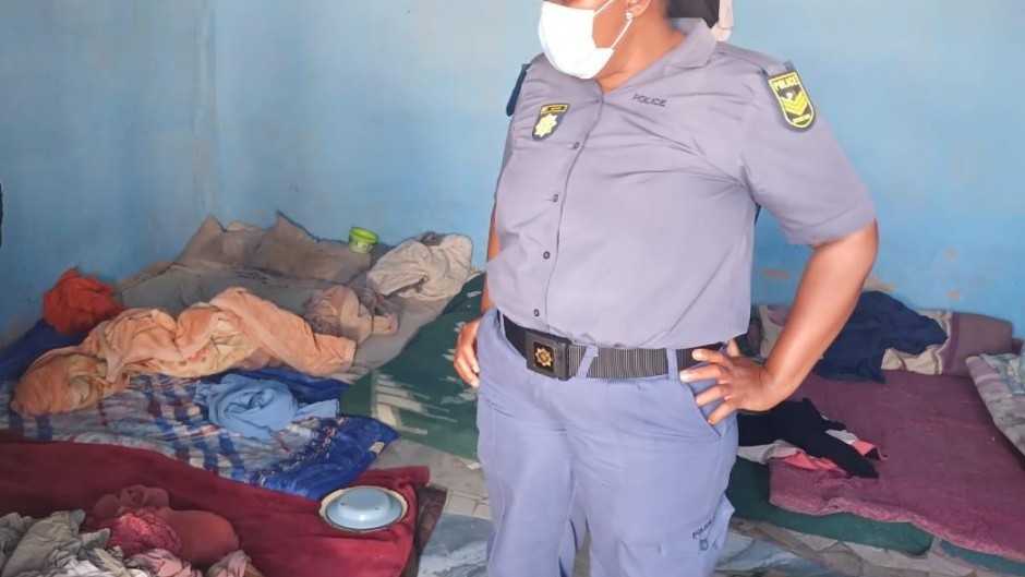 A police officer inside the illegal rehab centre in Mpumalanga. Supplied