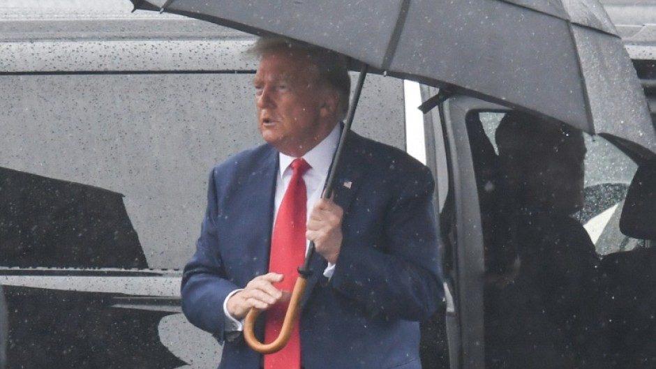 Former US president Donald Trump at Reagan National airport after pleading not guilty to charges of conspiring to overturn the 2020 election