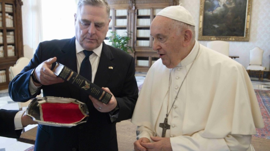 Pope Francis exchanged gifts with US Chairman of the Joint Chiefs of Staff US General Mark A Milley (L)