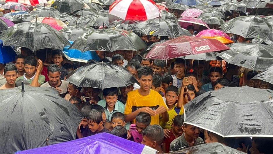 Rohingya refugees gather for a rally marking the sixth anniversary of the violence that drove them from their homes