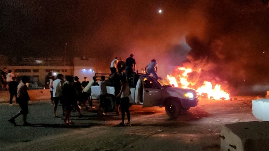 Libyans burn tyres as they protest in Tripoli