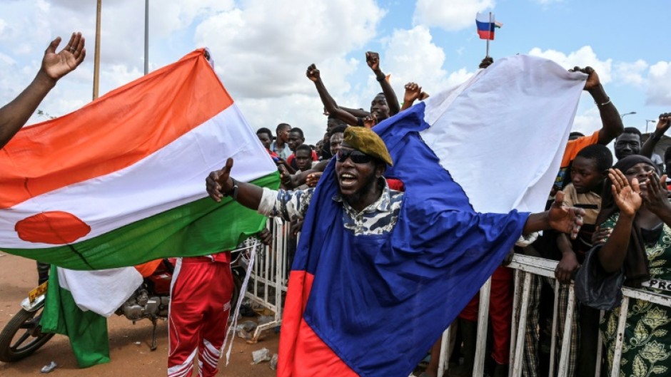 Protesters supporting the military leaders behind last months' coup gathered outside the French airbase in Niger 