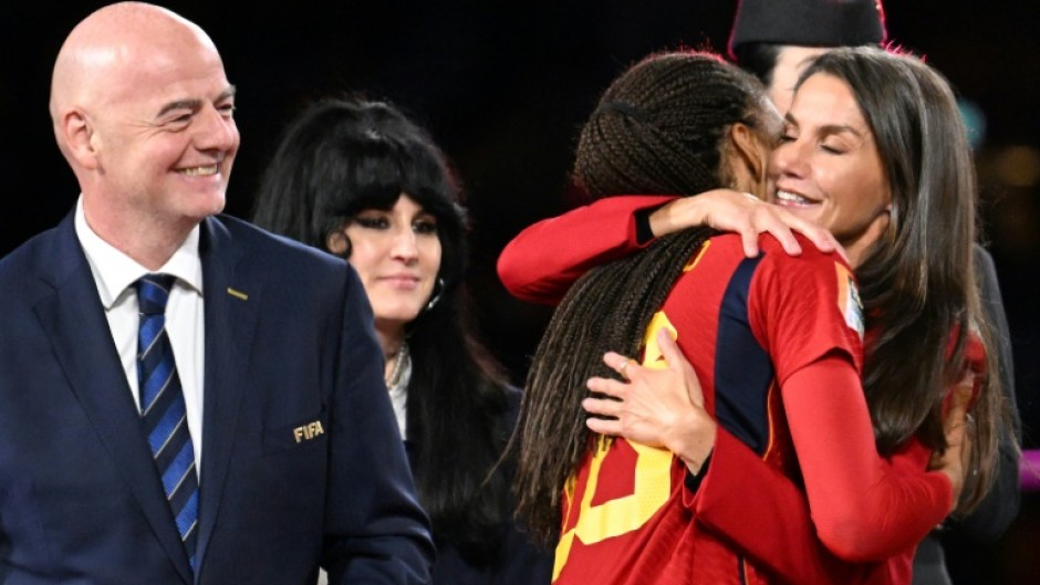 Gianni Infantino watches as Spain's Queen Letizia embraces Spain's Salma Paralluelo after the World Cup final 