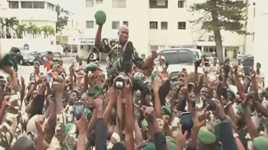 Oligui, seen in TV footage being carried aloft by his soldiers last Wednesday