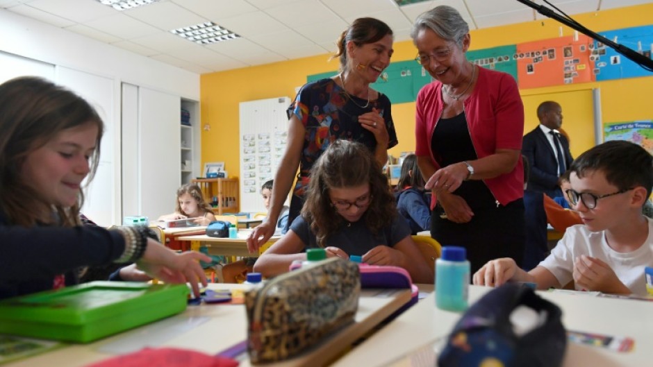 French Prime Minister Elisabeth Borne said implementation of the ban was so far going well