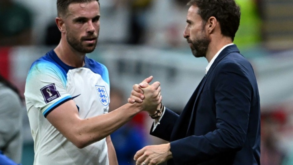 England manager Gareth Southgate (right) will not be deterred from playing Jordan Henderson (left)