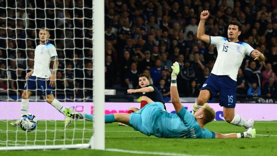 Harry Maguire (right) scored an own goal in England's 3-1 friendly win over Scotland 
