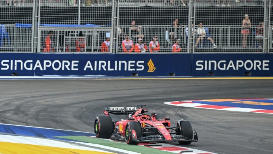 Ferrari's Monegasque driver Charles Leclerc sets the pace during the first practice session of the Singapore Grand Prix