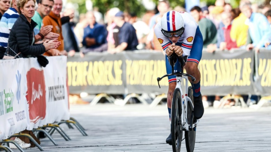 Teenage dream: Britain's Joshua Tarling rides to victory in the individual time trial 