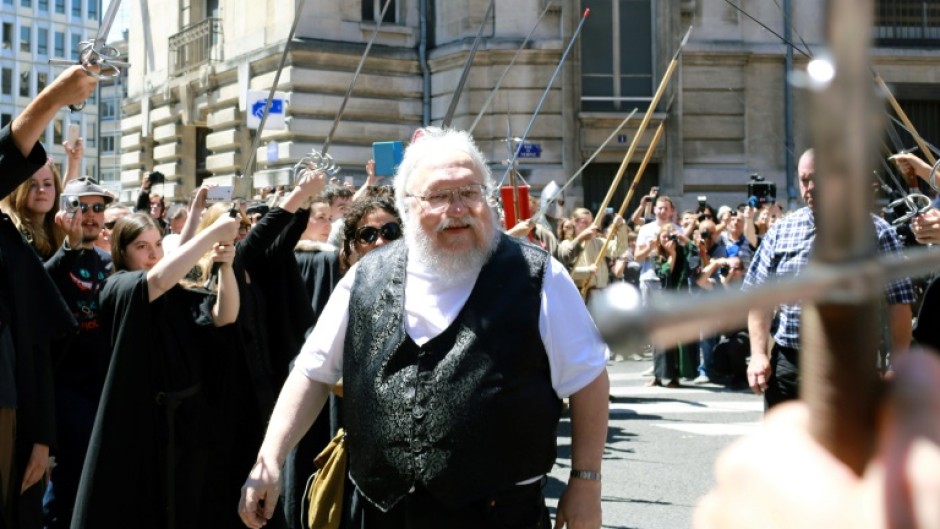 "Game of Thrones" author George RR Martin arrives to attend a book signing in France in 2014, awaited by more than a thousand fans