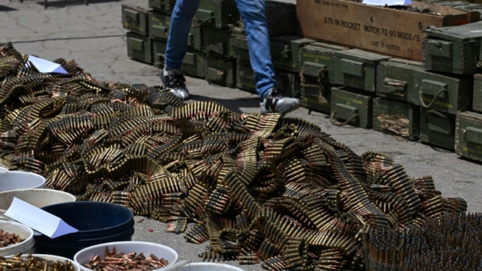 Buckets of bullets and ammunition belts were seized from within the prison 
