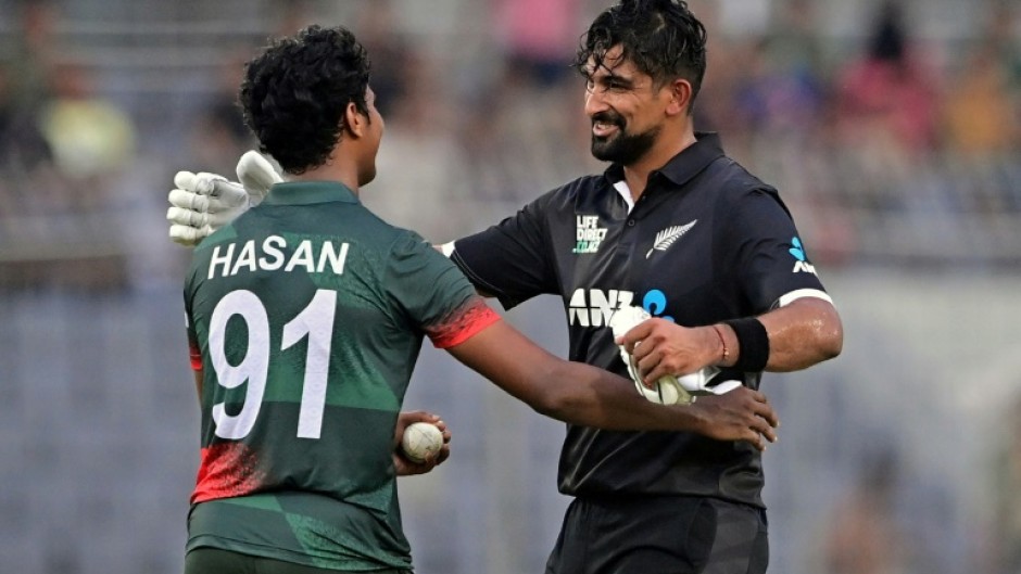 No hard feelings: New Zealand's Ish Sodhi (right) embraces Bangladesh's Hasan Mahmud after the bowler had performed a 'Mankad' dismissal