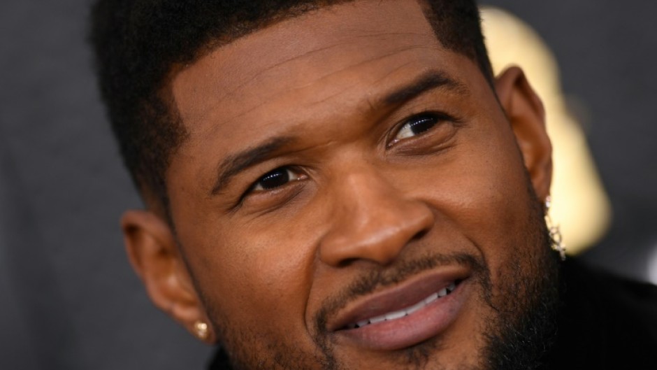 Usher, shown here at the Grammys in 2020, will helm the 2024 Super Bowl halftime show