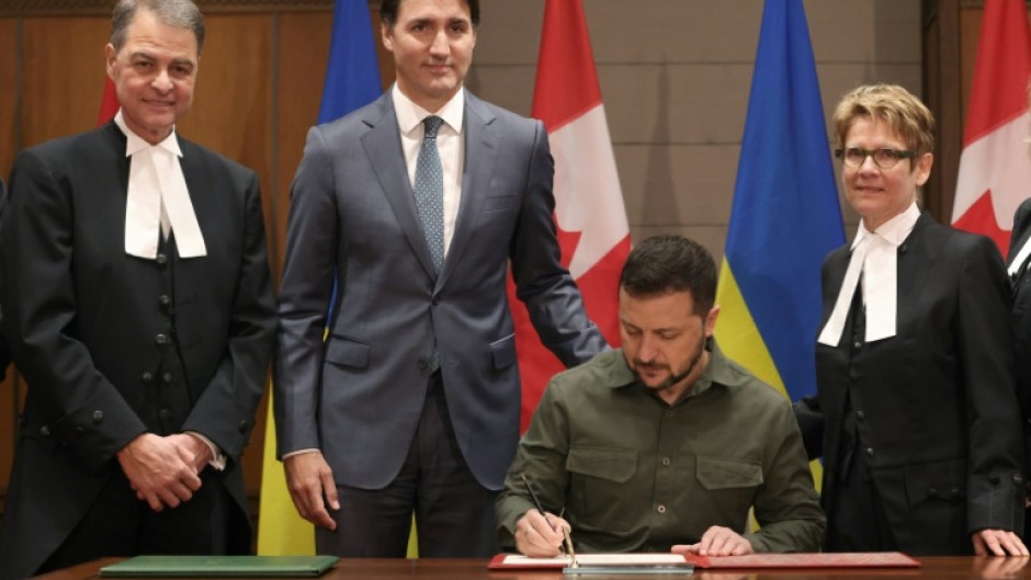 Canadian Speaker Anthony Rota (L) apologised for the incident, which occurred during a visit by Ukrainian President Volodymyr Zelensky (2nd R) 