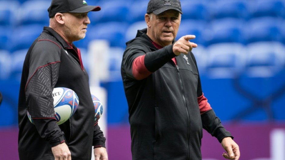 Wales head coach Warren Gatland (right) has turned around Welsh rugby fortunes since returning to the job and they became the first team to qualify for the Rugby World Cup quarter-finals
