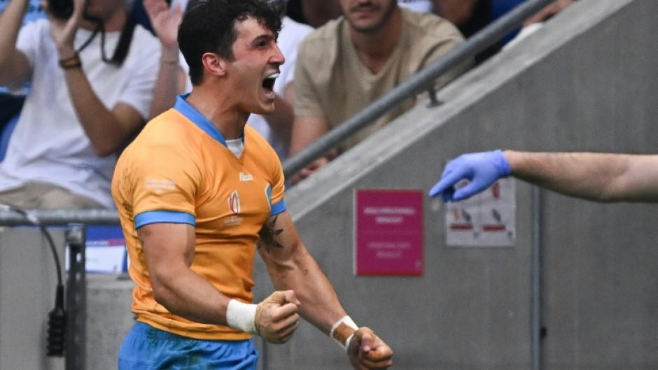 Full-back Baltazar Amaya celebrates after scoring his second try as Uruguay denied Namibia a first ever World Cup win in 26 attempts