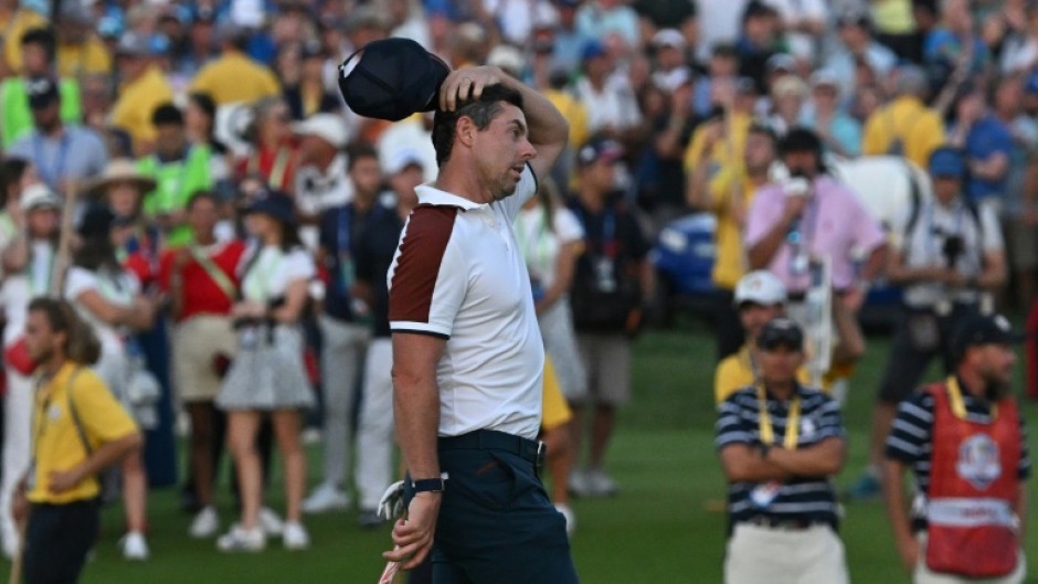 Rory McIlroy narrowly missed his effort to match Cantlay's birdie