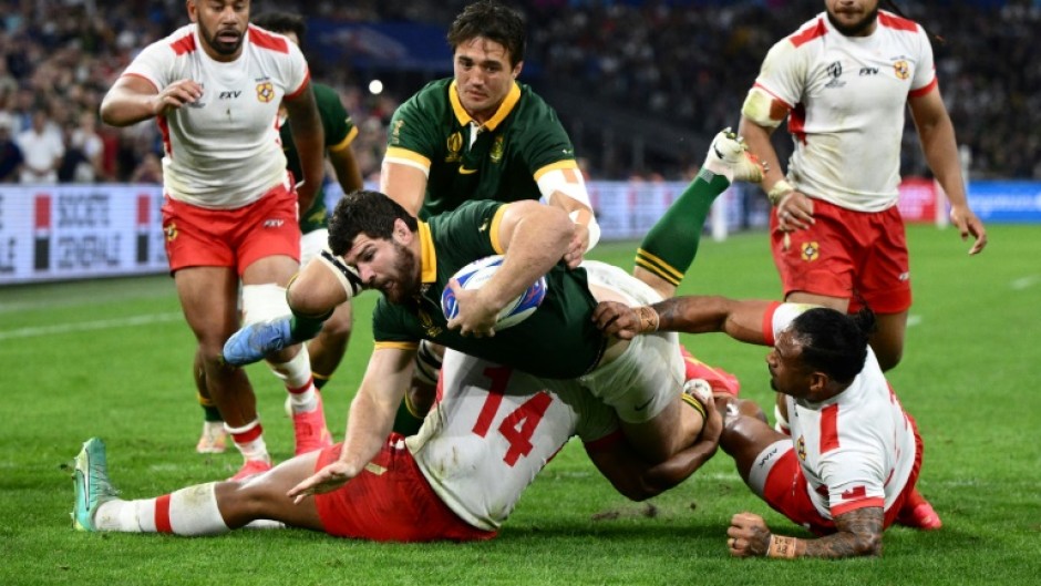South Africa flanker Marco van Staden scores a try against Tonga