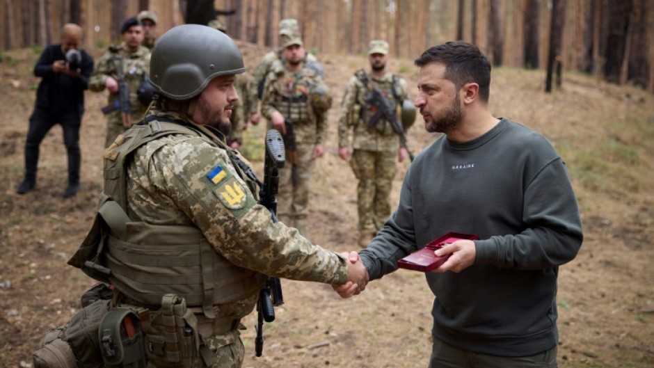 Ukrainian President Volodymyr Zelensky said on Tuesday he was visiting troops near the eastern front line