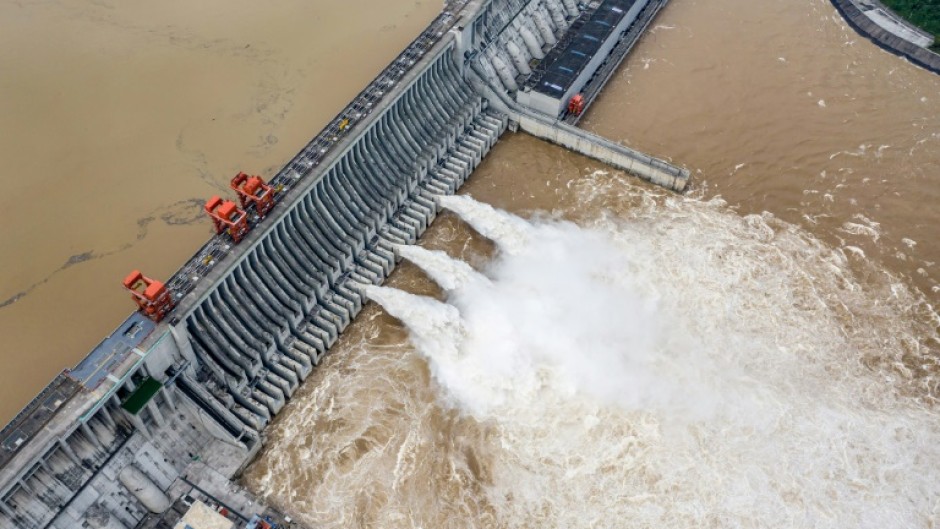 Water is released from the Three Gorges Dam, a hydropower project on the Yangtze river, in central China's Hubei province, in 2020