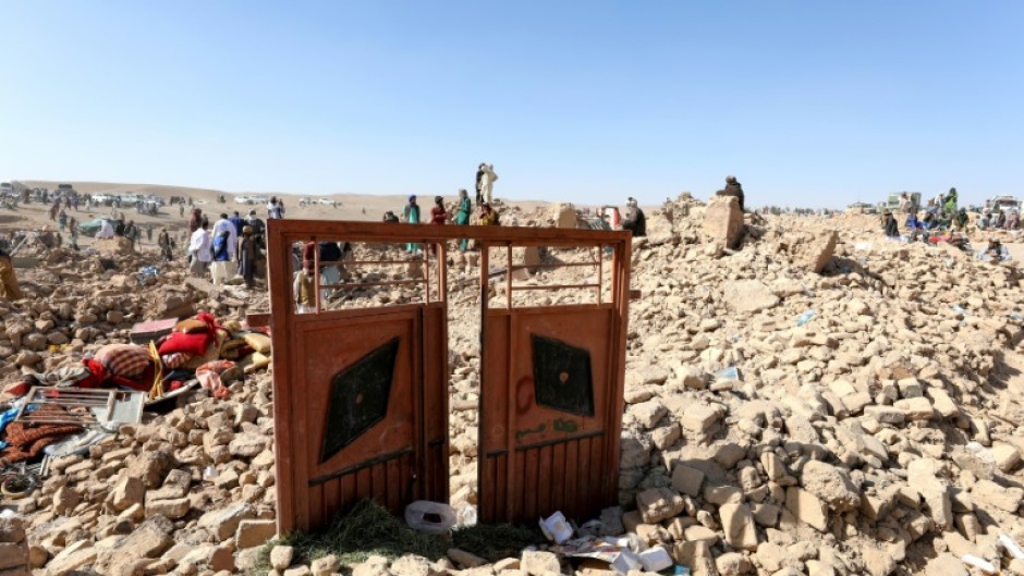 Volunteers brought shovels to help dig through the rubble of flattened villages