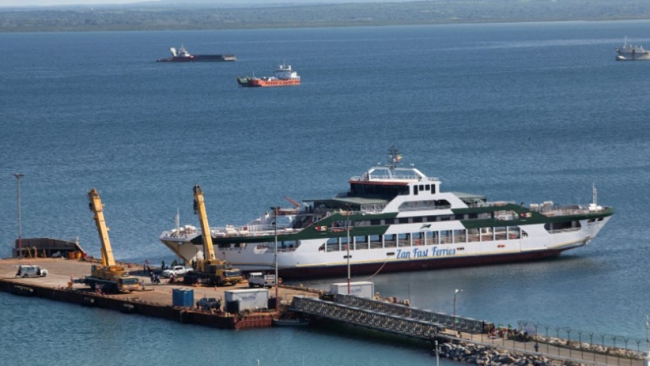 TotalEnergies used a ferry to evacuate people during the March 2021 attack by armed insurgents at its gas facility in Mozambique, but survivors and relatives of victims say the French company did not do enough to protect contractors