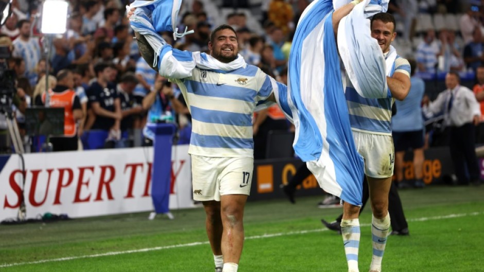 Try-scorer Joel Sclavi (L) and goalkicker Emiliano Boffelli (R) celebrate after guiding Argentina past Wales into the World Cup semi-finals
