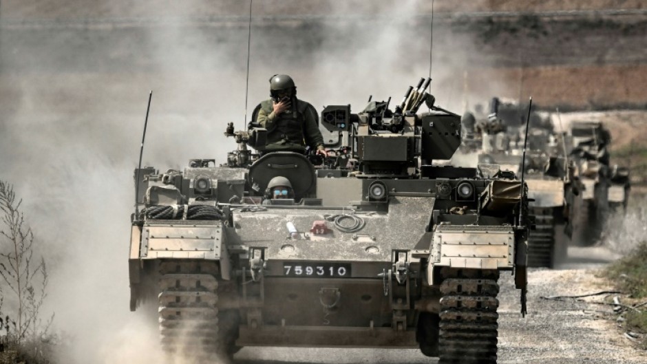 Thousands of Israeli troops and heavy weaponry are amassed on the border with Gaza