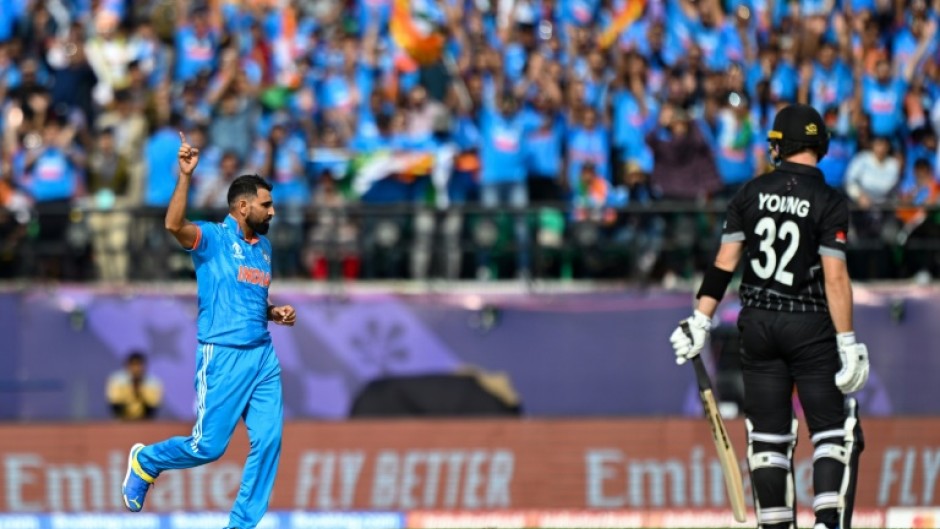 'Like a Ferrari': India's Mohammed Shami celebrates after taking the wicket of New Zealand's Will Young at Dharamsala on Sunday 