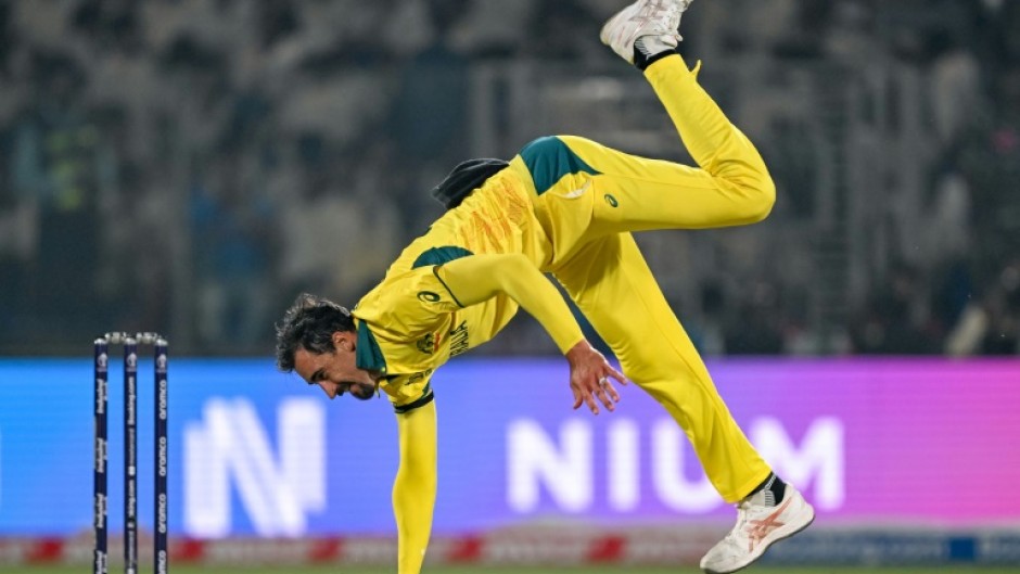 Hot streak: Australia's Mitchell Starc fields the ball during the win over the Netherlands in New Delhi