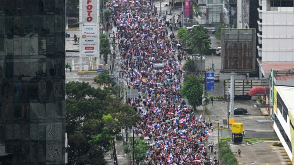 Panamanian protesters march against a government contract with a Canadian mining giant in Panama City on October 27, 2023